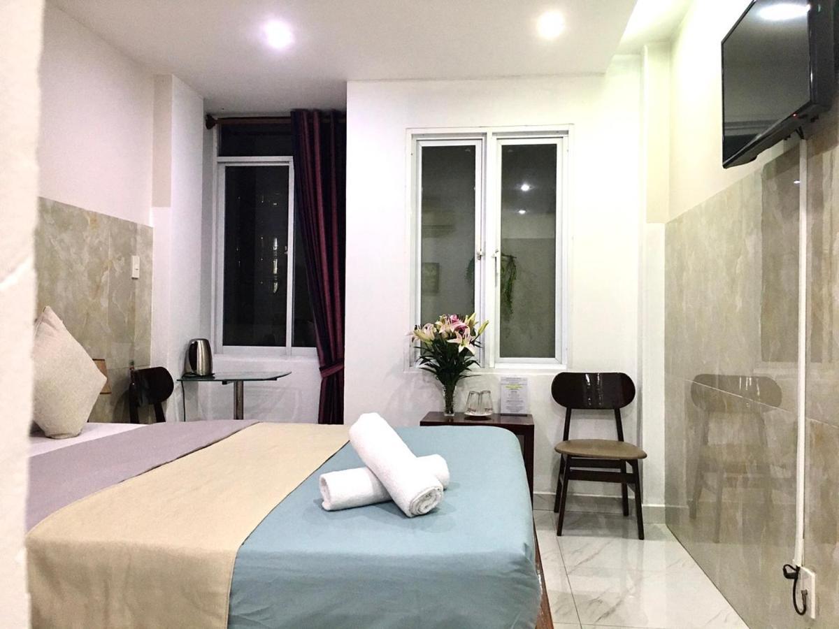 Saigon Cozy Hotel "241 Pham Ngu Lao Street" Hô Chi Minh-Ville Extérieur photo